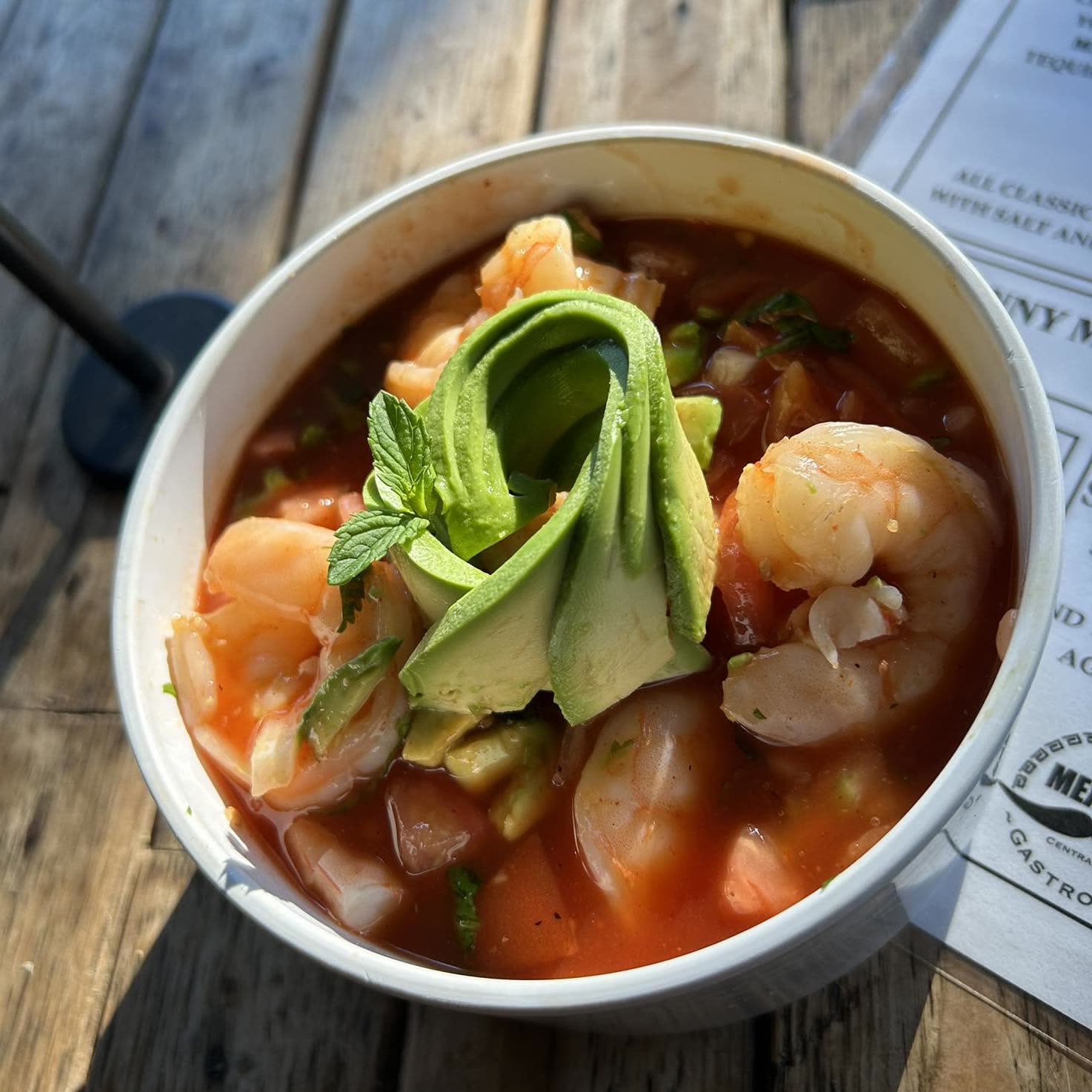Mexican shrimp cocktail with avocado in tomato-citrus broth at The Mexican at Central, Central SC
