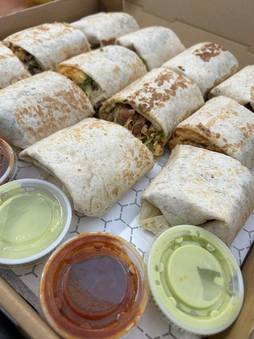 A catering box of burritos
